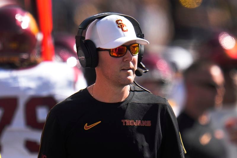 Southern California head coach Lincoln Riley watches against Michigan in the first half of an NCAA college football game in Ann Arbor, Mich., Saturday, Sept. 21, 2024. (AP Photo/Paul Sancya)