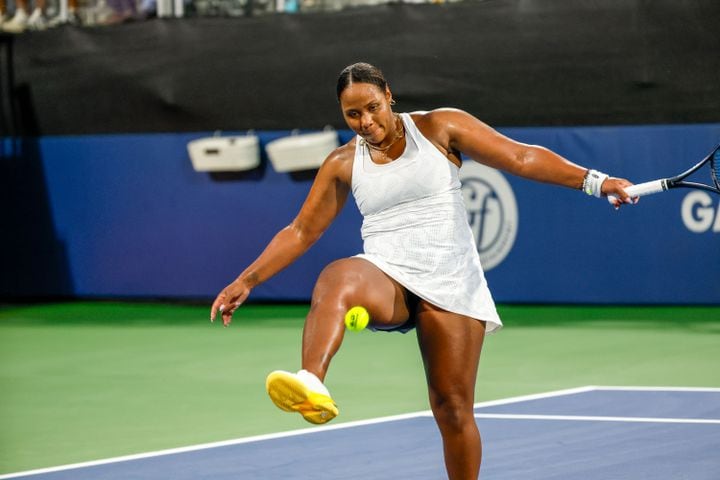 Taylor Townsend tries to return the ball with her feet after a point against Sloane Stephens during an exhibition match in the Atlanta Open at Atlantic Station on Sunday, July 21, 2024, in Atlanta.
(Miguel Martinez / AJC)