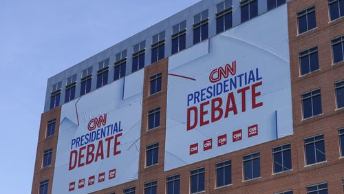 CNN Presidential Debate signs are shown on the CNN-Techwood campus on 10th Street. CNN will host the Presidential Debate between former President Donald Trump and President Joe Biden on Thursday night.
