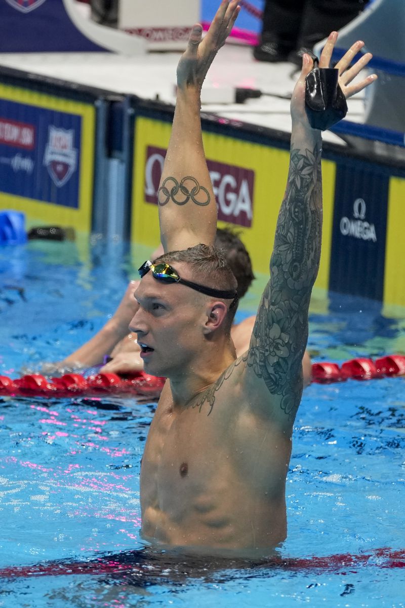 Caeleb Dressel reacts after winning the Men's 100 butterfly finals Saturday, June 22, 2024, at the US Swimming Olympic Trials in Indianapolis. (AP Photo/Darron Cummings)