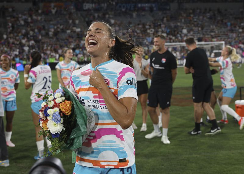 San Diego Wave's Alex Morgan reacts after an NWSL soccer game against the North Carolina Courage on Sunday, Sept. 8 2024, in San Diego. (Sandy Huffaker/The San Diego Union-Tribune via AP)