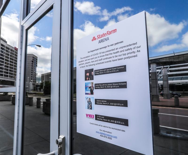 A sign on the doors of State Farm Arena in Atlanta on Monday, April 13, 2020, informs the public of shows canceled because of the stay-at-home mandate imposed amid the coronavirus pandemic. JOHN SPINK/JSPINK@AJC.COM