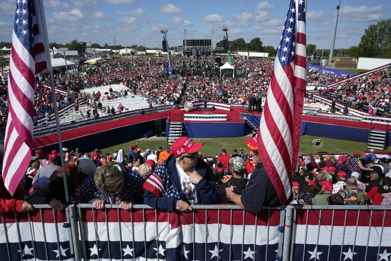 Supporters arrive before Republican presidential nominee former President Donald Trump speaks at a campaign rally at the Butler Farm Show, the site where a gunman tried to assassinate him in July, Saturday, Oct. 5, 2024, in Butler, Pa. (AP Photo/Alex Brandon)