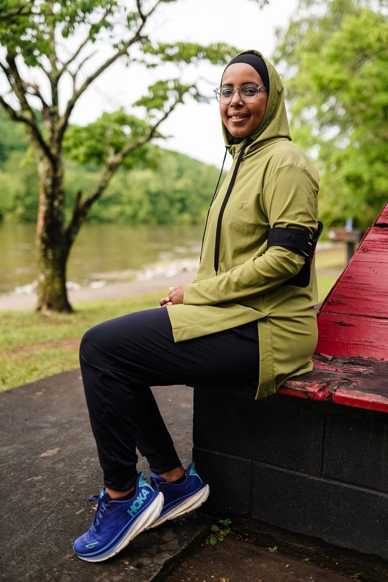 Atlanta Muslim Running Club member Yousra Mohamoud poses for a photo prior to a training run at Willeo Park. (Elijah Nouvelage for The Atlanta Journal-Constitution)