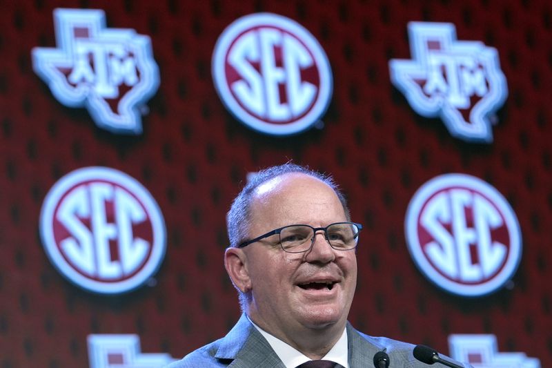 FILE - Texas A&M head coach Mike Elko speaks during Southeastern Conference NCAA college football media days, Thursday, July 18, 2024, in Dallas. (AP Photo/LM Otero, File)