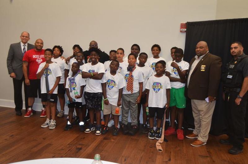 The annual luncheon, hosted by the Phoebe Network of Trust, gives the kids the opportunity to learn to tie a necktie and spend time with adult males in their community. (Photo Courtesy of Alan Mauldin)