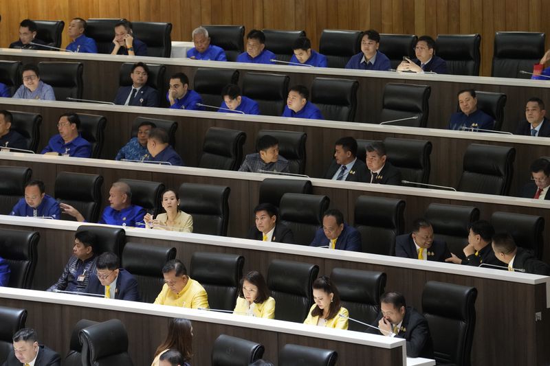 Lawmakers attend a debate before a vote to select the new prime minister at the Parliament in Bangkok, Thailand, Friday, Aug. 16, 2024, (AP Photo/Sakchai Lalit)