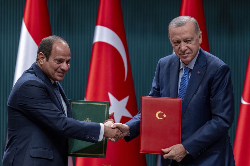 Turkish President Recep Tayyip Erdogan, right, shakes hands with Egyptian President Abdel Fattah el-Sissi during a bilateral signature agreements ceremony at the Presidential palace in Ankara, Wednesday, Sept. 4, 2024. (AP Photo/Francisco Seco)