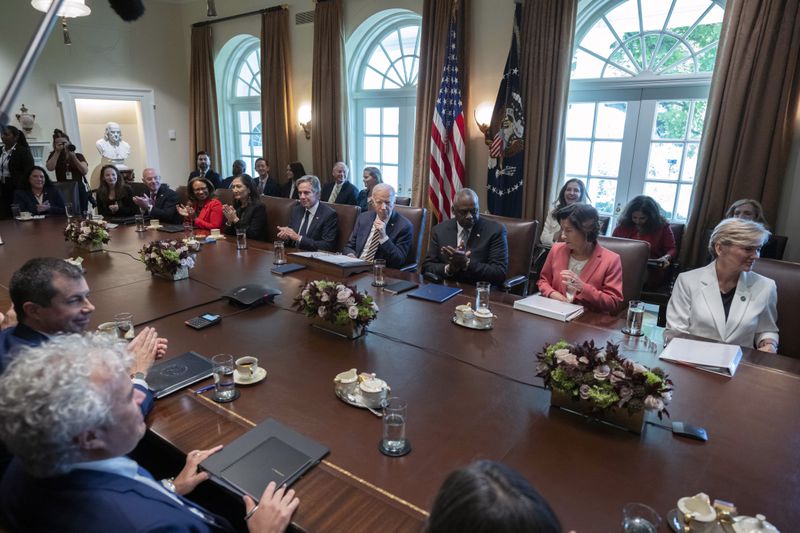 President Joe Biden, back row, center, speaks during a meeting with the members of his cabinet and first lady Jill Biden, in the Cabinet Room of the White House, Friday, Sept. 20, 2024. (AP Photo/Manuel Balce Ceneta)