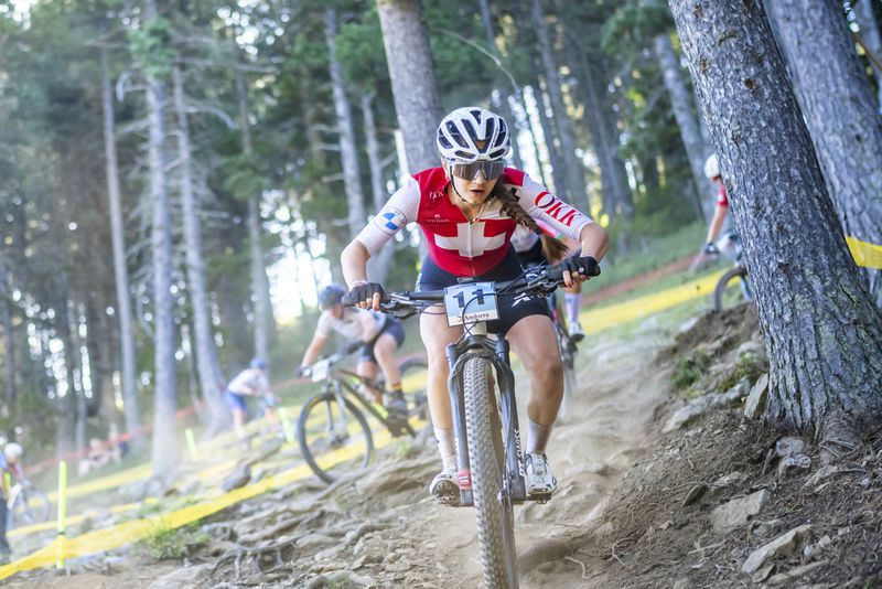 FILE - Muriel Furrer from Switzerland, in action during the UCI Cross Country Junior Women, XCO, Mountain Bike World Championship, Aug. 30, 2024, in Pal Arinsal, Andorra. (Maxime Schmid/Keystone via AP, File)