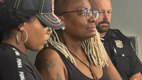 Tanisha Smith (left) and Della Reeves, the victim's friend and mother, spoke during a news conference Thursday afternoon at Atlanta police headquarters.