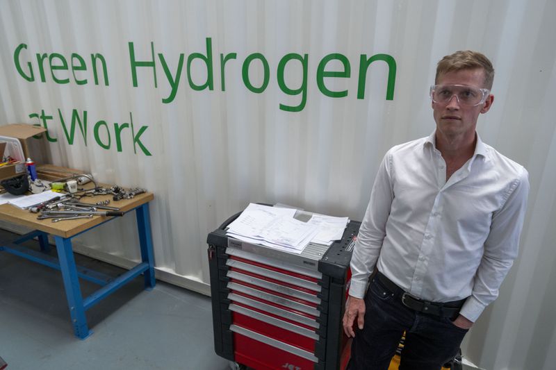 Jordi Zonneveld poses for a portrait at Plug Power where they produce green hydrogen in Alphen aan den Rijn, Netherlands, Friday, June 16, 2023. (AP Photo/Peter Dejong)