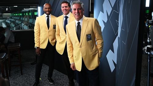 Louis Riddick (from left), Brian Griese and Steve Levy make up the new broadcast crew for "Monday Night Football." (Al Powers / ESPN Images)