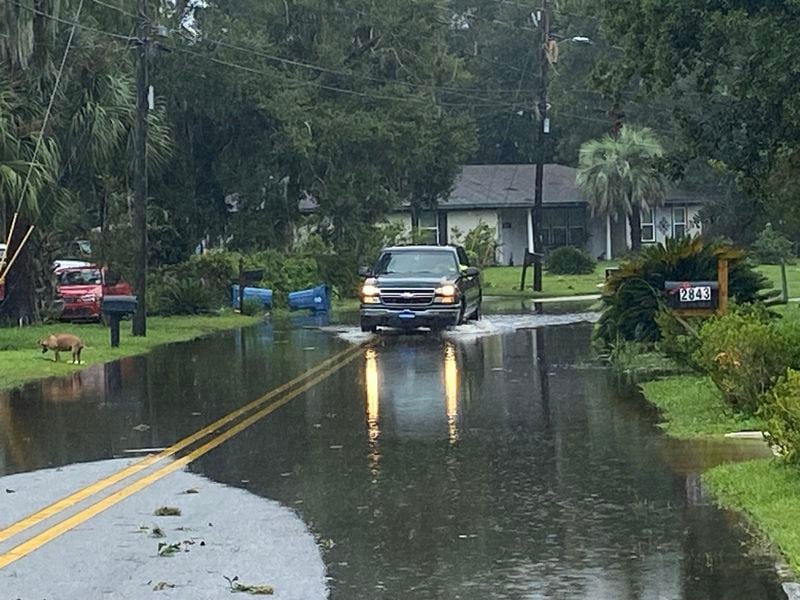 A section of Palamor Drive in the College Park neighborhood of Brunswick, Georgia turned into a lake on Tuesday, Aug. 6, 2024 after Tropical Storm Debby passed through.