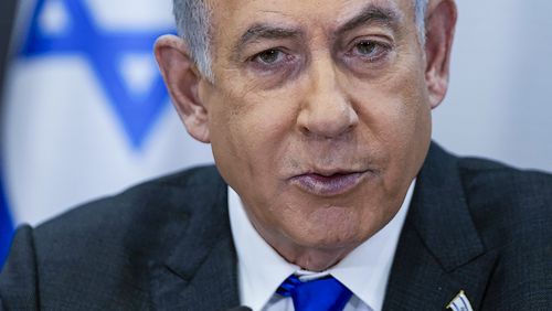 FILE - Israeli Prime Minister Benjamin Netanyahu chairs a cabinet meeting at the Kirya military base, which houses the Israeli Ministry of Defense, in Tel Aviv, Israel, on Dec. 24, 2023. (AP Photo/Ohad Zwigenberg, Pool, File)