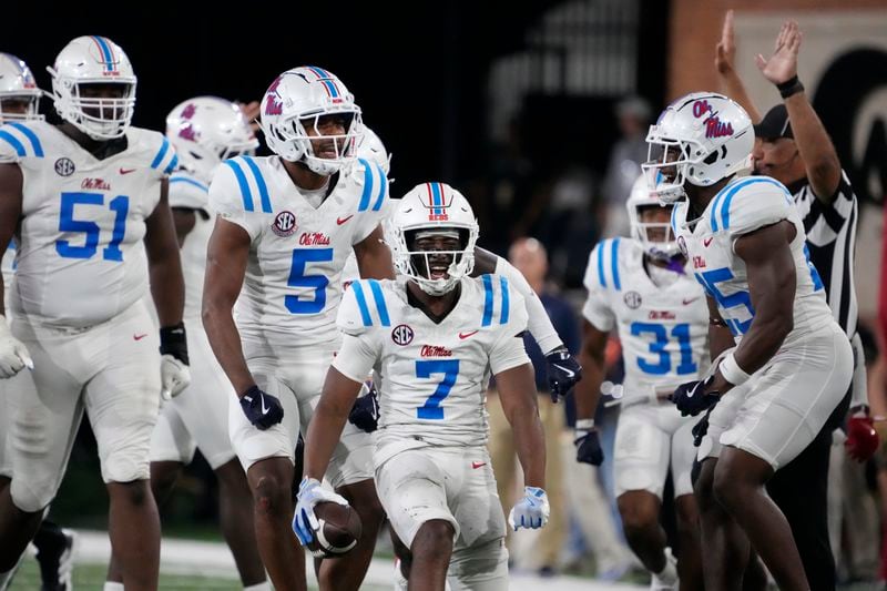 Mississippi safety Louis Moore (7) celebrates with teammates after recovering a Wake Forest fumble during the second half of an NCAA college football game in Winston-Salem, N.C., Saturday, Sept. 14, 2024. (AP Photo/Chuck Burton)