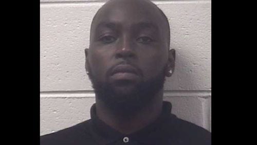 Malon B. Neal, 24, was charged with speeding, reckless driving and using wireless communications while driving.