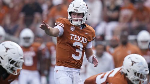 Texas quarterback Quinn Ewers (3) signals during the first half of an NCAA college football game against UTSA in Austin, Texas, Saturday, Sept. 14, 2024. (AP Photo/Eric Gay)