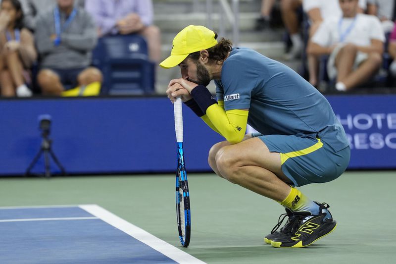 Jordan Thompson, of Australia, reacts against Alex de Minaur, of Australia, during a fourth round match of the U.S. Open tennis championships, Monday, Sept. 2, 2024, in New York. (AP Photo/Eduardo Munoz Alvarez)