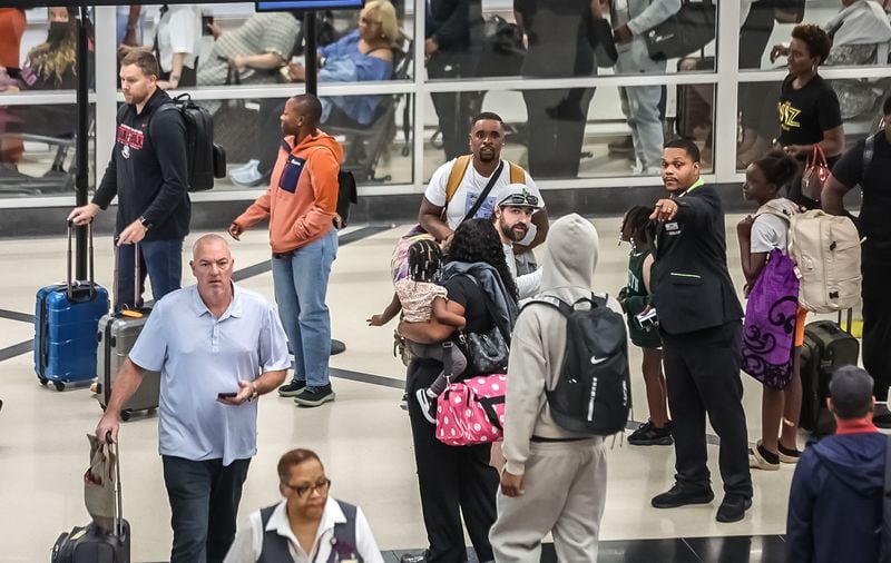 Travelers streamed into Hartsfield-Jackson International Airport on Friday, August 30, 2024, which was expected to be the busiest day of the Labor Day travel period. (John Spink / John.Spink@ajc.com)