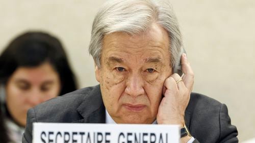 FILE - U.N. Secretary-General Antonio Guterres listens to a speech during the opening of the High-Level Segment of the 55th session of the Human Rights Council at the European headquarters of the United Nations in Geneva, Switzerland, on Feb. 26, 2024. Guterres appealed for funding Friday, July 13, 2024, for the beleaguered U.N. agency helping Palestinian refugees in Gaza and elsewhere in the Middle East, accusing Israel of issuing evacuation orders that force Palestinians “to move like human pinballs across a landscape of destruction and death.”(Salvatore Di Nolfi/Keystone via AP, File)