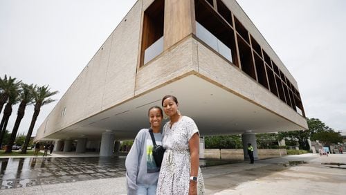 Nedra Rhone and her daughter Layla, 12, visit the new International African American Museum in Charleston, South Carolina during a tour of Black history museums of the South.