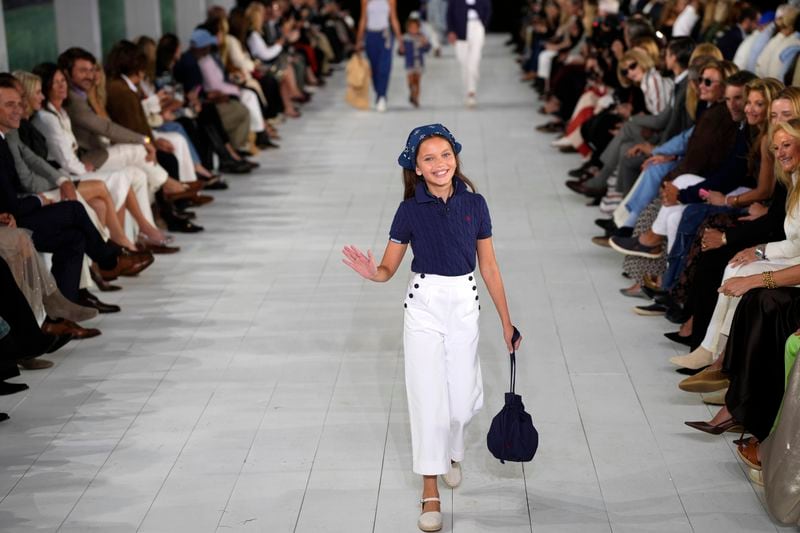 A model walks the runway during the Ralph Lauren Spring/Summer 2025 fashion show as part of New York Fashion Week on Thursday, Sept. 5, 2024, at Khalily Stables in Bridgehampton, N.Y. (Photo by Charles Sykes/Invision/AP)