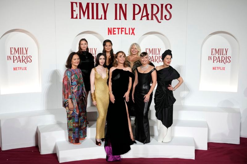 The cast of "Emily in Paris" poses before the premiere in Rome, Tuesday, Sept. 10, 2024. (AP Photo/Andrew Medichini)