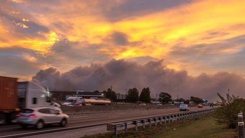 Rockdale County residents, especially those with respiratory problems, were told to shelter in place again on Tuesday, Oct. 1, 2024 if a large cloud of smoke from a Conyers chemical plant fire moves into their vicinity. The county, with a population of more than 90,000, had been under a shelter-in-place order after the fire broke out Sunday, but authorities lifted the order at 7:45 p.m. Monday. Officials then advised residents to hunker down again early Tuesday if winds pushed the plume overhead. (John Spink/AJC)