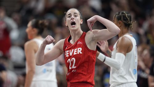 Indiana Fever guard Caitlin Clark reacts during the first half of a WNBA basketball game against the Phoenix Mercury, Friday, Aug. 16, 2024, in Indianapolis. (AP Photo/Darron Cummings)