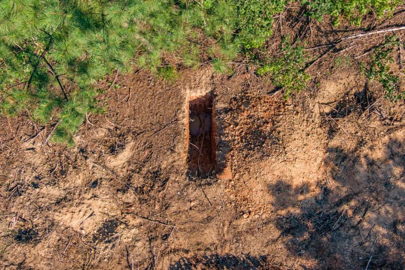 An aerial view of one small pit on the site in mid-July. (Photo Courtesy of Lee Hedgepeth/Inside Climate News)