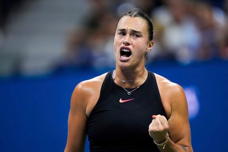 Aryna Sabalenka, of Belarus, reacts during a match against Erika Andreeva, of Russia, in the third round of the U.S. Open tennis championships early Saturday, Aug. 31, 2024, in New York. (AP Photo/Julia Nikhinson)