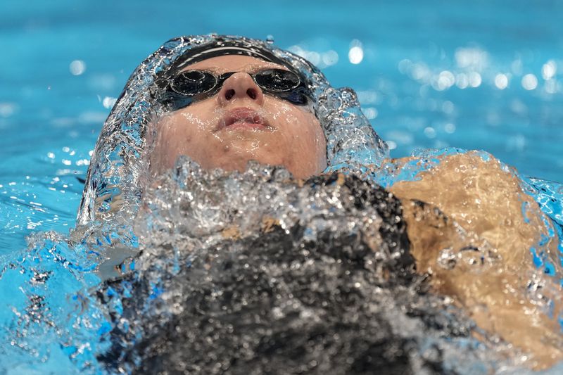 Kate Douglass swims during the Women's 200 individual medley finals Saturday, June 22, 2024, at the US Swimming Olympic Trials in Indianapolis. (AP Photo/Michael Conroy)