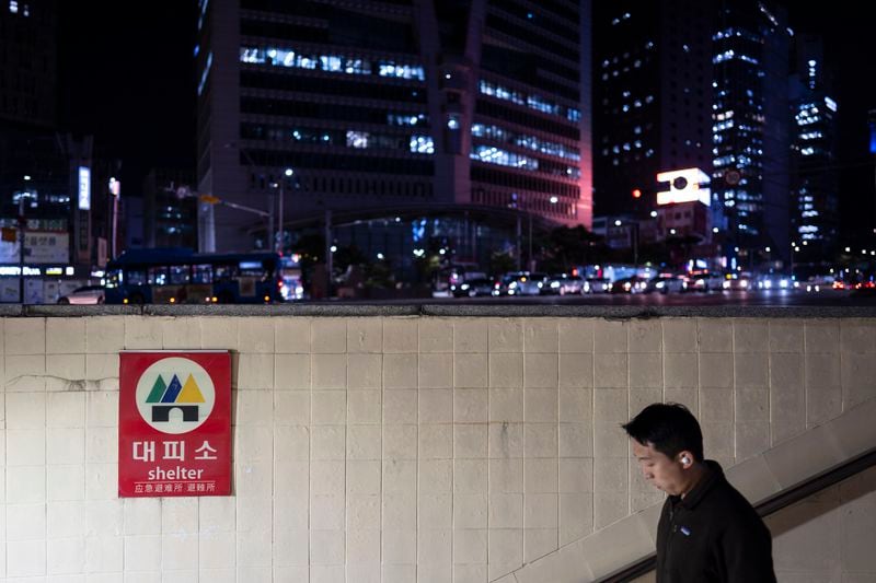 A man walks down the steps of a metro station that doubles as an emergency shelter in Seoul, South Korea, Monday, May 27, 2024. (AP Photo/Jae C. Hong)