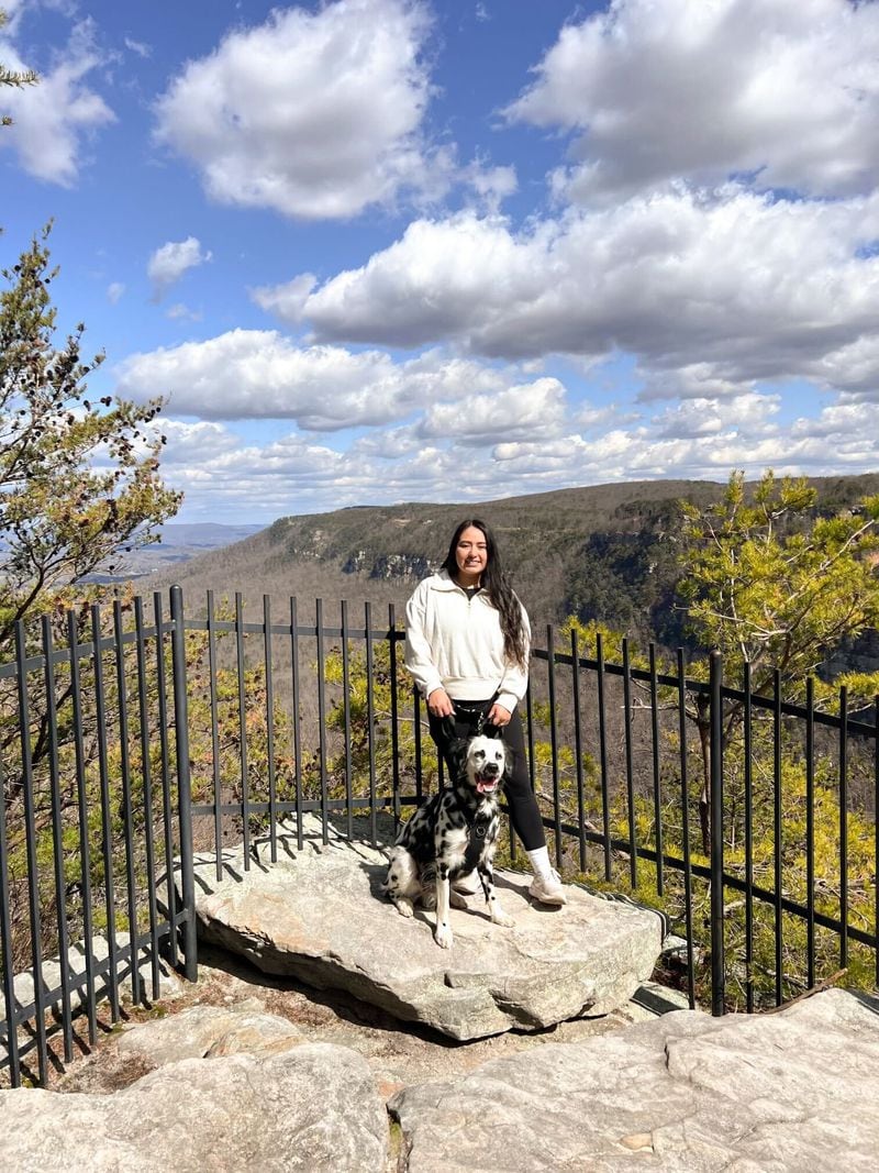Sandra Macedo and her dog, Ryder, are shown here on a hike at Cloudland Canyon State Park. Macedo, 28, lives near Norcross and was moved to take a run in honor of Laken Riley, the nursing student who was killed in Athens while out for a run.