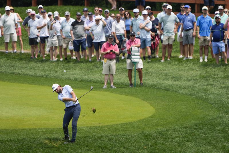 Cameron Young hits on the 12th hole during the third round of the Travelers Championship golf tournament at TPC River Highlands, Saturday, June 22, 2024, in Cromwell, Conn. (AP Photo/Seth Wenig)