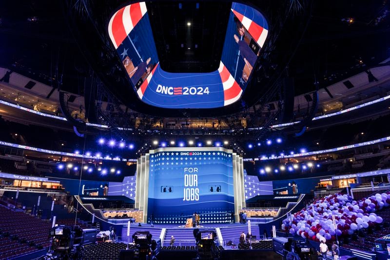 Workers prepare for next week's Democratic National Convention at the United Center in Chicago, Thursday, Aug. 15, 2024. (AP Photo/J. Scott Applewhite)