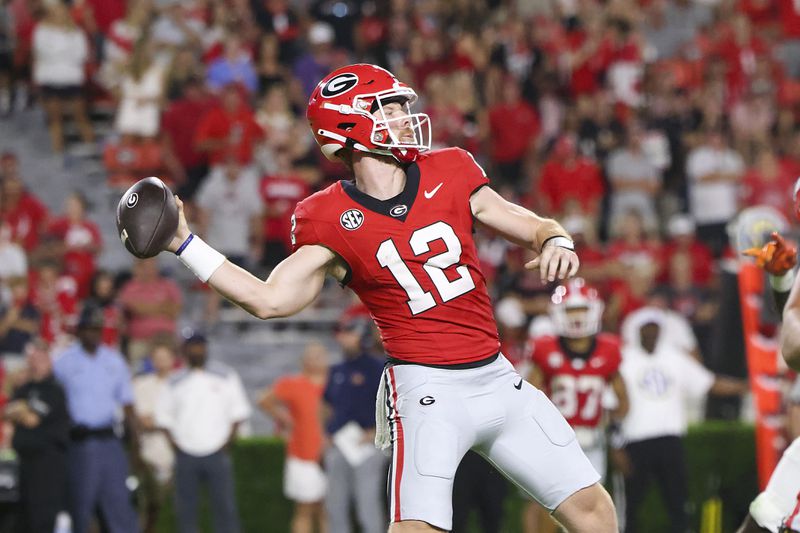 Georgia quarterback Brock Vandagriff (12) attempts a pass during the fourth quarter against UT Martin at Sanford Stadium, Saturday, September 2, 2023, in Athens, Ga. Georgia won 48-7. (Jason Getz / Jason.Getz@ajc.com)