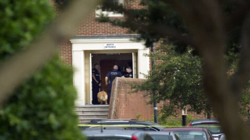 Police work the scene of a mass shooting in VIrginia Beach, Virginia, on Friday.