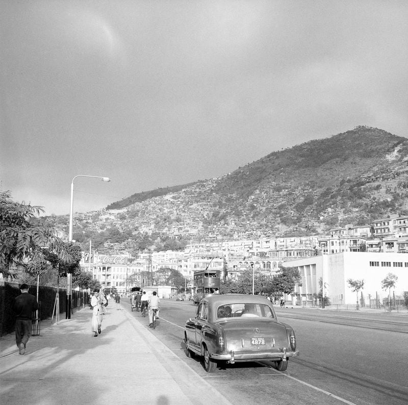 FILE- View of Hong Kong 's hillsides with "squatter" huts of refugees in this photo from 1959. (AP Photo/Fred Waters, File)