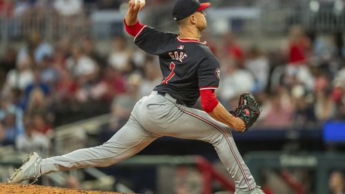 Washington Nationals pitcher MacKenzie Gore throws in the fourth inning of a baseball game against the Atlanta Braves, Friday, Aug. 23, 2024, in Atlanta. (AP Photo/Jason Allen)