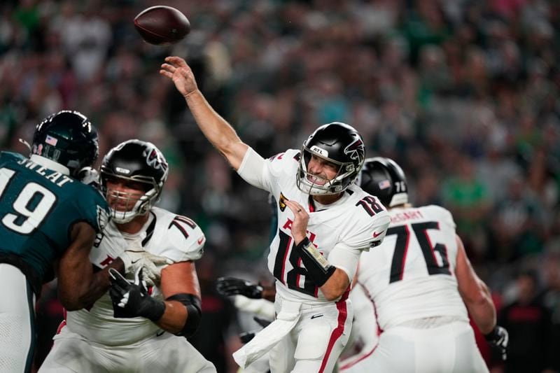 Atlanta Falcons quarterback Kirk Cousins (18) throws during the first half of an NFL football game against the Philadelphia Eagles on Monday, Sept. 16, 2024, in Philadelphia. (AP Photo/Matt Slocum)