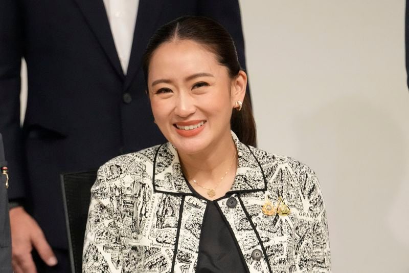 Leader of Pheu Thai Party, Paetongtarn Shinawatra, daughter of Thailand's former Prime Minister Thaksin Shinawatra, smiles during press conference in Bangkok, Thailand, Thursday, Aug. 15, 2024. (AP Photo/Sakchai Lalit)