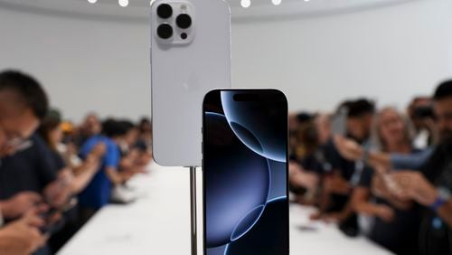 The new iPhone 16 is displayed during an announcement of new products at Apple headquarters Monday, Sept. 9, 2024, in Cupertino, Calif. (AP Photo/Juliana Yamada)