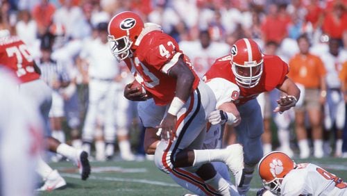 Georgia running back David McCluskey in action against Clemson on Sept. 20, 1986. McCluskey played for the Bulldogs from 1983-86. He also played at West Rome High School. (AJC file photo)