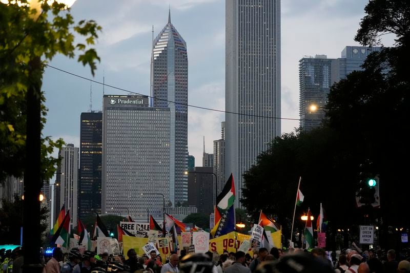 Protesters march prior to the start of the Democratic National Convention Sunday, Aug. 18, 2024, in Chicago. (AP Photo/Frank Franklin II)