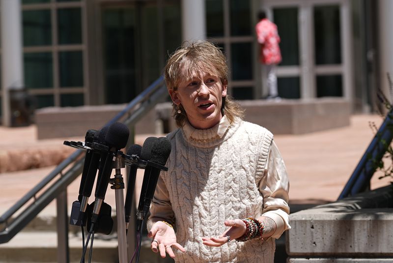 Wyatt Kent speaks after the sentencing of the shooter who killed five people and injured 19 others at a Colorado Springs LGBTQ+ club, at a hearing Tuesday, June 18, 2024, in Denver. The shooter pleaded guilty to federal hate crime charges and was sentenced to 55 life terms in prison. (AP Photo/David Zalubowski)