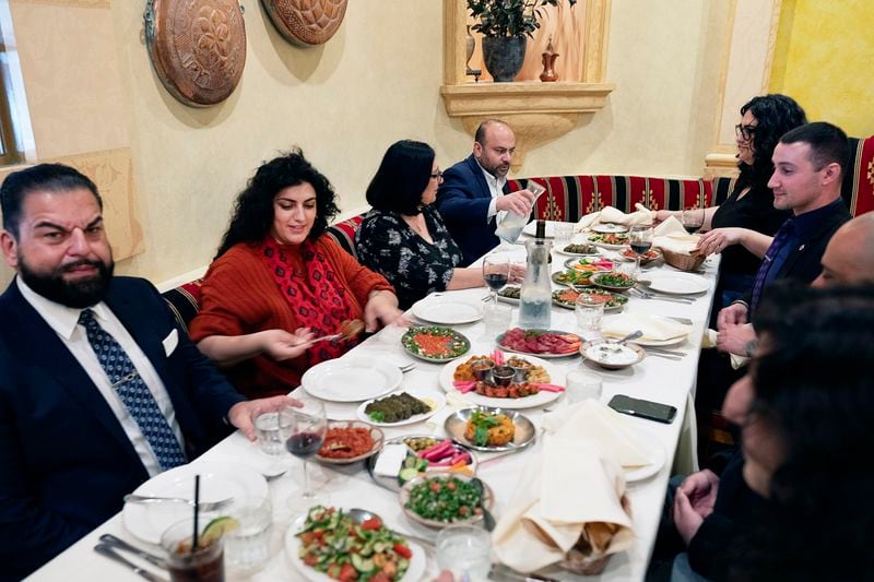 Sophia Armen, chair of the Census Committee of the Armenian National Committee of America-Western Region , second from left, is joined at lunch by members of the Armenian-American Census Coalition at the Carousel a Lebanese-Armenian restaurant in Glendale, Calif. on Friday, May 17, 2024. For some race and ethnic groups, how the U.S. government categorizes them for crucial surveys and the once-a-decade census is still falling short. Hmong as well as Armenian, Arab American and Brazilian communities say they feel excluded or diminished when it comes to how they are counted in their own country. (AP Photo/Richard Vogel)
