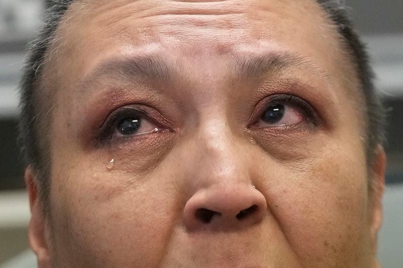 Julie Manning, who is currently battling cancer, speaks at the tribal health clinic where she works as an accounting specialist on March 15, 2024, in Owyhee, Nev., on the Duck Valley Indian Reservation that straddles the Nevada-Idaho border. (AP Photo/Rick Bowmer)