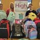 Volunteers with North Fulton Community Charities sort and distribute new backpacks and school supplies each year for the organization's Back-to-School campaign. (Courtesy North Fulton Community Charities)